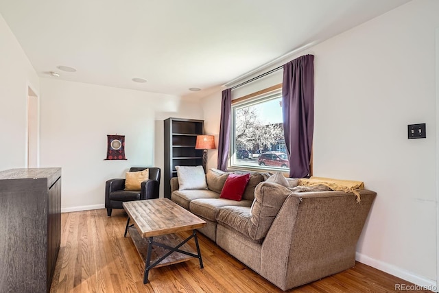 living room with light hardwood / wood-style floors