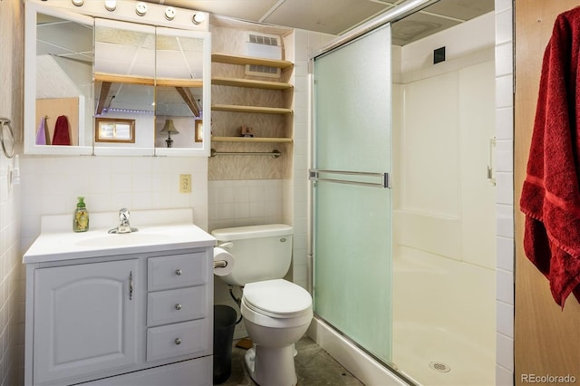 2777 W 106th Cir, Westminster, CO 80234 - bathroom with tile walls, a stall shower, and vanity