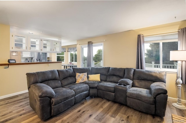 2777 W 106th Cir, Westminster, CO 80234 - living room featuring wood finished floors and baseboards