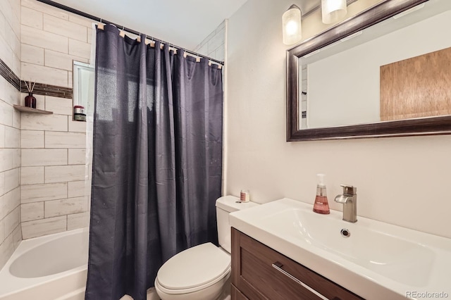 bathroom featuring toilet, vanity, and shower / bath combo