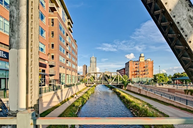 view of property's community featuring a view of city and a water view