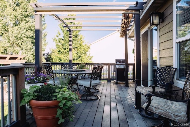 wooden deck with a pergola