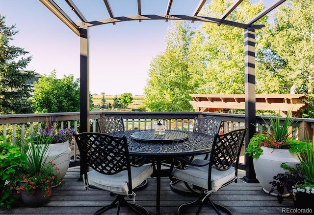 wooden deck featuring a pergola