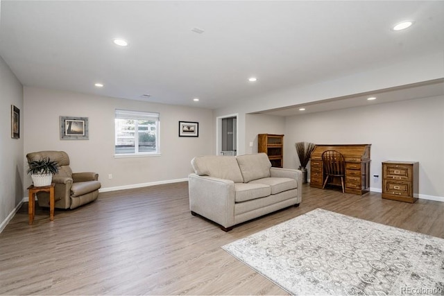 living room with light hardwood / wood-style floors