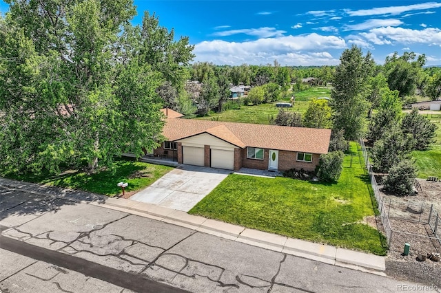 11310 W 46th Ave, Wheat Ridge, CO 80033 - ranch-style house with a garage, brick siding, concrete driveway, and roof with shingles