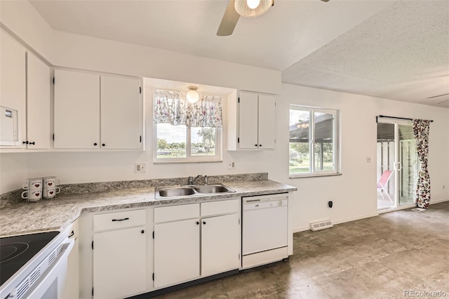 11310 W 46th Ave, Wheat Ridge, CO 80033 - kitchen with white appliances, a sink, ceiling fan, white cabinets, and light countertops