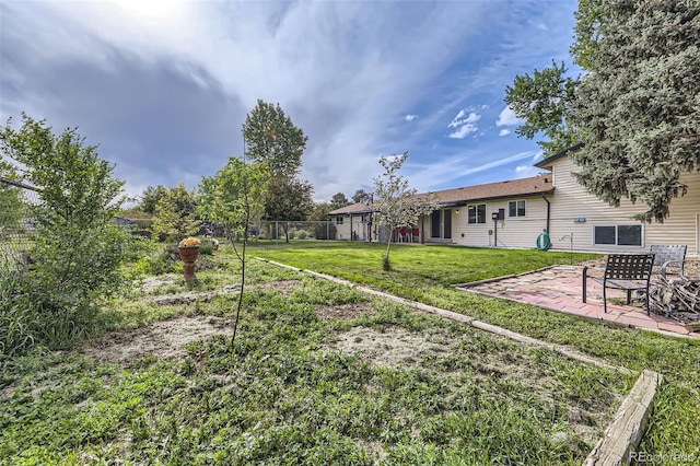 11310 W 46th Ave, Wheat Ridge, CO 80033 - view of yard with a patio area