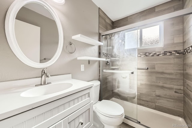 11310 W 46th Ave, Wheat Ridge, CO 80033 - bathroom featuring toilet, a shower stall, and vanity