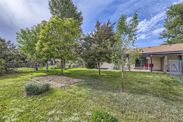 11310 W 46th Ave, Wheat Ridge, CO 80033 - view of yard with a patio