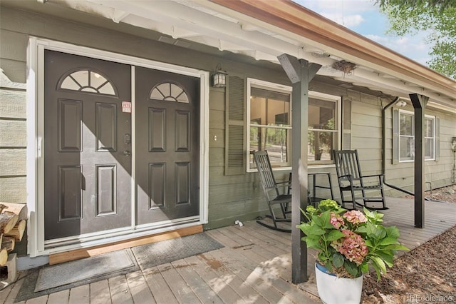 1021 Lodge Pole Dr, Black Hawk, CO 80422 - doorway to property with a porch and a wooden deck