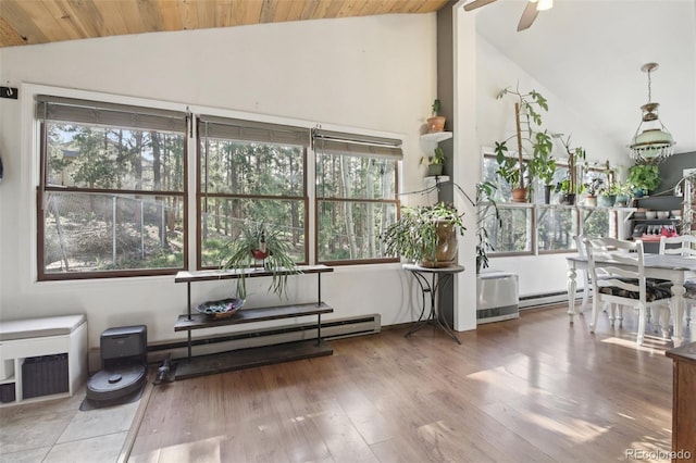 1021 Lodge Pole Dr, Black Hawk, CO 80422 - interior space featuring vaulted ceiling, a baseboard radiator, ceiling fan, wood finished floors, and wooden ceiling