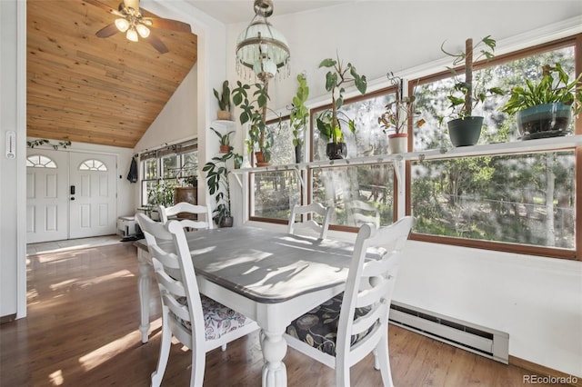 1021 Lodge Pole Dr, Black Hawk, CO 80422 - dining space featuring a baseboard radiator, wood finished floors, wood ceiling, a ceiling fan, and high vaulted ceiling