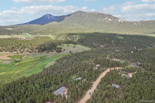 1021 Lodge Pole Dr, Black Hawk, CO 80422 - view of mountain backdrop featuring a heavily wooded area