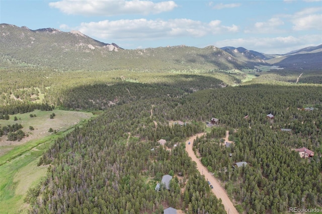 1021 Lodge Pole Dr, Black Hawk, CO 80422 - view of mountain backdrop with a heavily wooded area