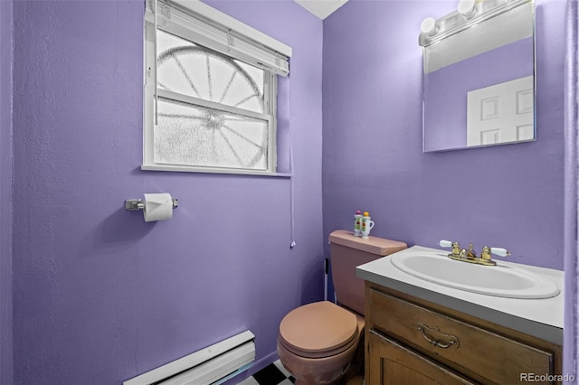 4501 S Garrison St, Littleton, CO 80123 - bathroom with baseboard heating and vanity