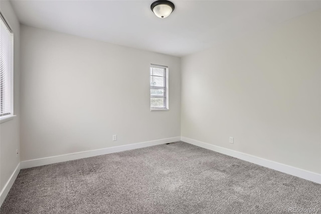 9605 E Kansas Cir Unit 53, Denver, CO 80247 - carpeted spare room with baseboards