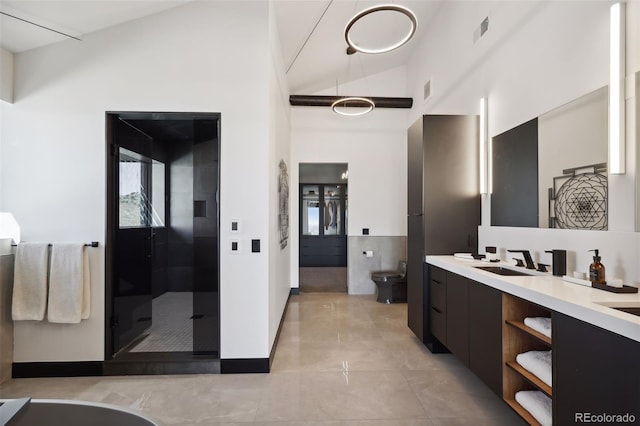 full bathroom featuring double vanity, a stall shower, visible vents, high vaulted ceiling, and a sink