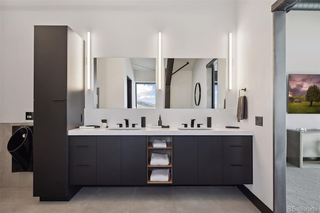 bathroom with double vanity and a sink