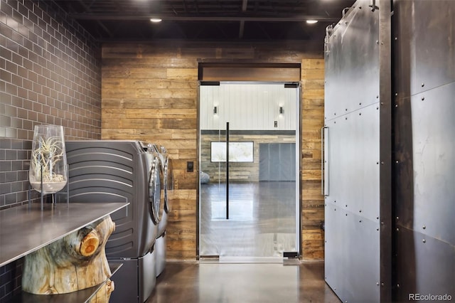 washroom featuring laundry area and washer and dryer