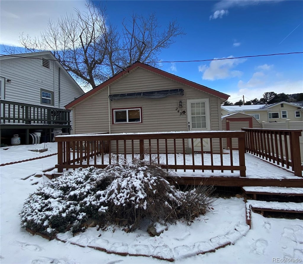 view of snow covered deck