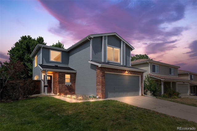 21535 E 39th Ave, Denver, CO 80249 - traditional-style home featuring brick siding, an attached garage, and concrete driveway