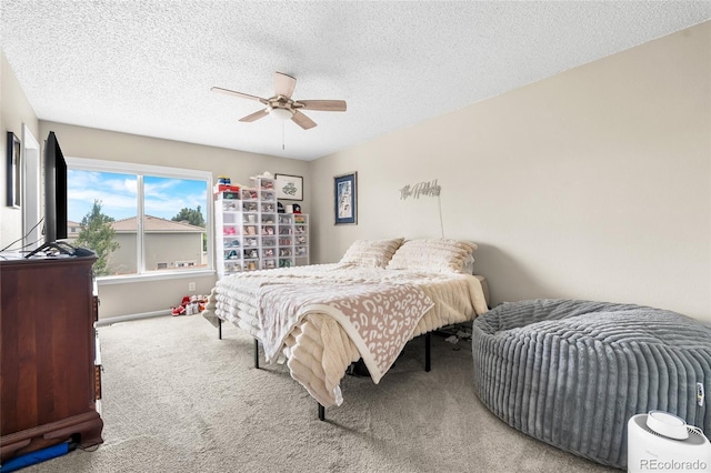 21535 E 39th Ave, Denver, CO 80249 - carpeted bedroom featuring a textured ceiling and a ceiling fan