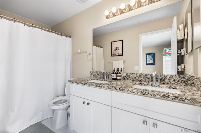 21535 E 39th Ave, Denver, CO 80249 - bathroom featuring double vanity and a shower with curtain
