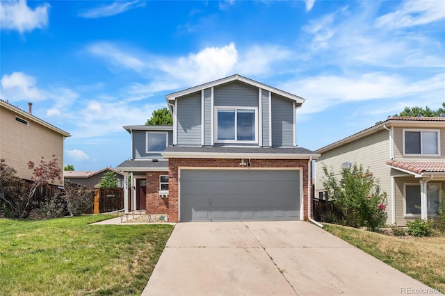 21535 E 39th Ave, Denver, CO 80249 - view of front of property featuring brick siding, an attached garage, and concrete driveway