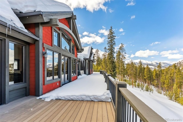 view of snow covered deck