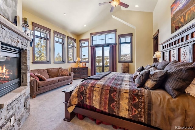 bedroom featuring ceiling fan, high vaulted ceiling, a stone fireplace, recessed lighting, and carpet flooring