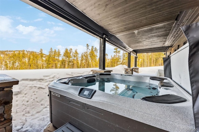 view of patio with a hot tub