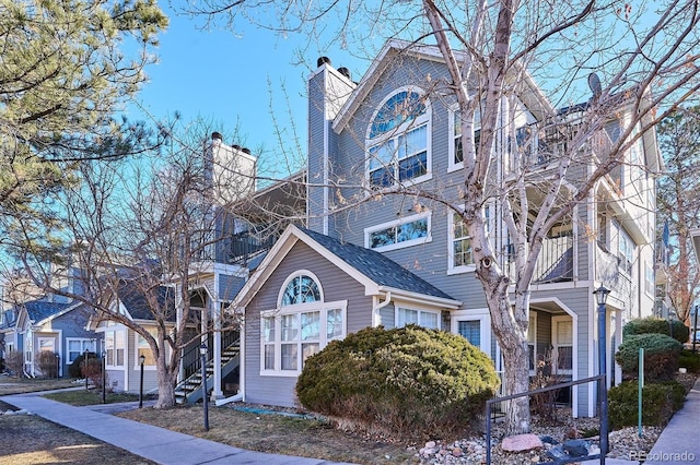 view of front of home with a chimney