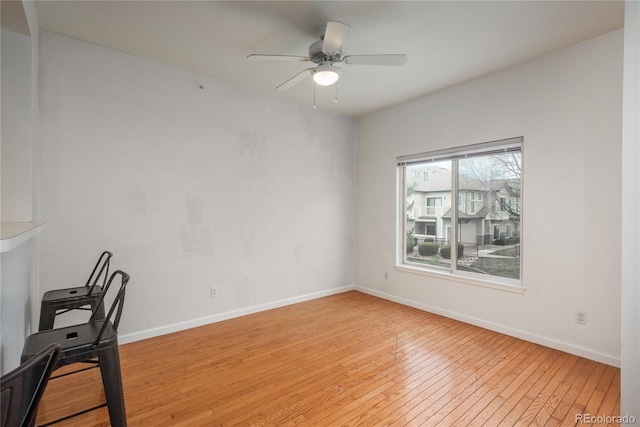 8707 E Florida Ave Unit 510, Denver, CO 80247 - unfurnished office featuring ceiling fan, baseboards, and light wood-style floors