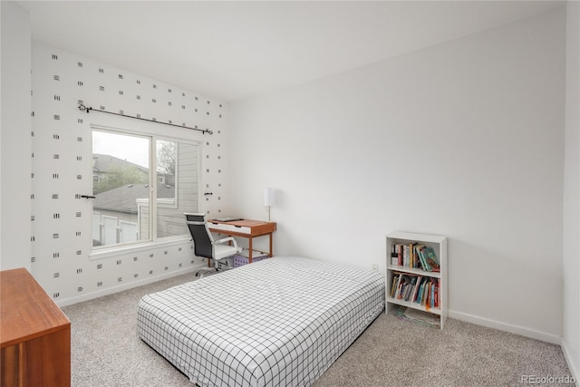 8707 E Florida Ave Unit 510, Denver, CO 80247 - bedroom featuring carpet flooring and baseboards