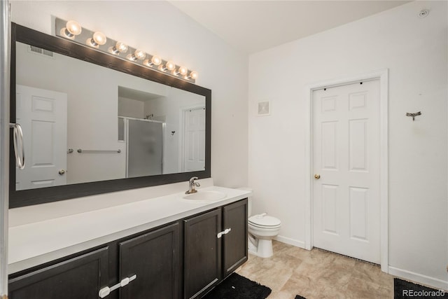 8707 E Florida Ave Unit 510, Denver, CO 80247 - bathroom with visible vents, vanity, toilet, and a shower stall