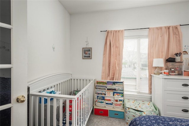 8707 E Florida Ave Unit 510, Denver, CO 80247 - bedroom with carpet floors and a nursery area