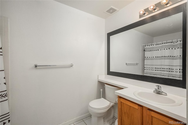 8707 E Florida Ave Unit 510, Denver, CO 80247 - full bath featuring vanity, toilet, tile patterned floors, baseboards, and visible vents