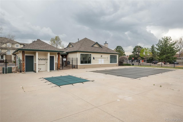 8707 E Florida Ave Unit 510, Denver, CO 80247 - community pool featuring a patio and fence