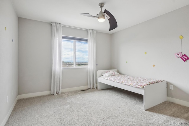 unfurnished bedroom with carpet and ceiling fan