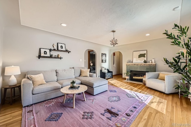 living room featuring hardwood / wood-style floors and a fireplace