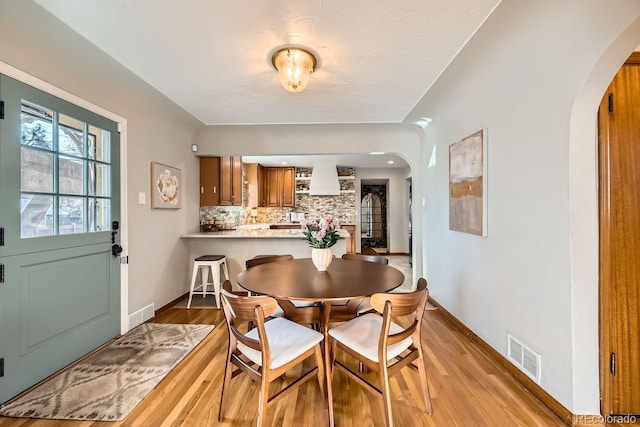 dining room featuring light wood-type flooring