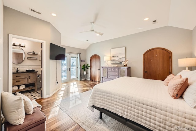 bedroom with french doors, vaulted ceiling, light wood-type flooring, ceiling fan, and access to exterior