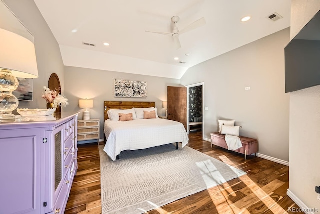 bedroom featuring ceiling fan, lofted ceiling, and dark hardwood / wood-style floors