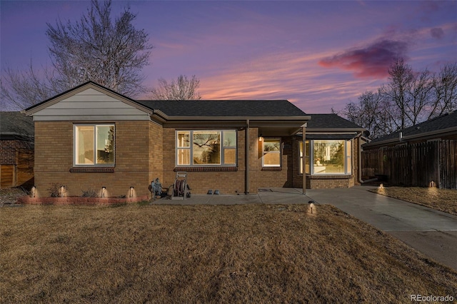 view of front of home featuring a yard