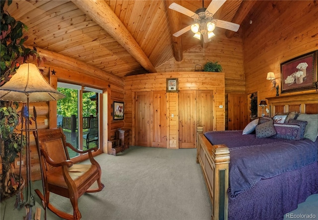 3115 State Highway 9, Guffey, CO 80820 - bedroom featuring carpet floors, access to outside, wood ceiling, and wooden walls