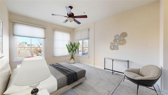 2500 E Cherry Creek S Drive 213, Denver, CO 80209 - bedroom featuring carpet floors, baseboards, and ceiling fan