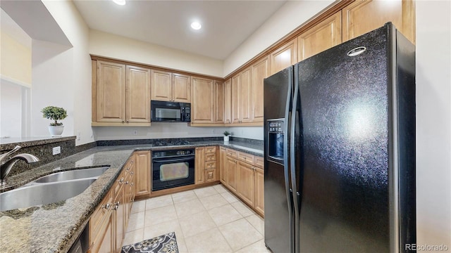 2500 E Cherry Creek S Drive 213, Denver, CO 80209 - kitchen featuring black appliances, a sink, light tile patterned floors, dark stone counters, and recessed lighting