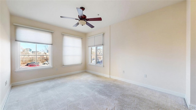 2500 E Cherry Creek S Drive 213, Denver, CO 80209 - empty room with light colored carpet, healthy amount of natural light, and baseboards