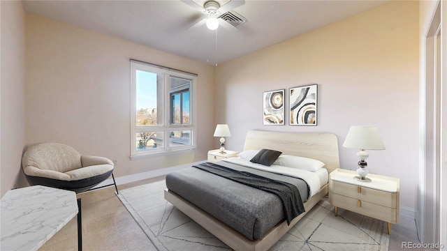 2500 E Cherry Creek S Drive 213, Denver, CO 80209 - bedroom featuring baseboards, a ceiling fan, and light colored carpet