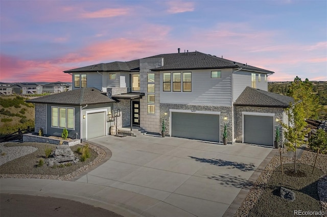 view of front of property featuring a garage